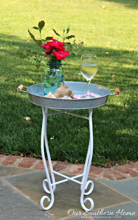 Small outdoor table makeover by our southern home using an old upcycled base and supplies from Walmart #themedfurnituremakeoverday