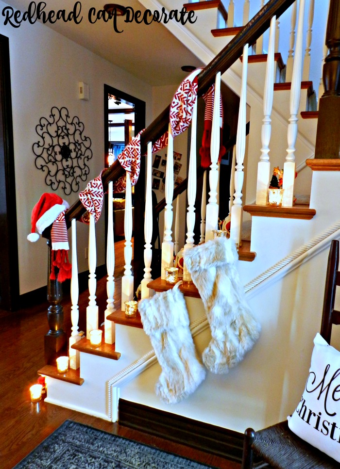 Wrap a scarf around the base of your bannister & add a Santa hat for a cozy Christmas idea...