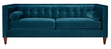 This teal blue velvet sofa is gorgeous! There are more colors, too!