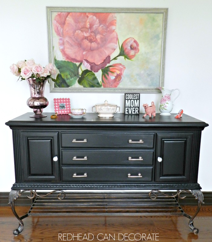 Check out this gorgeous black credenza makeover! When in doubt paint to black.