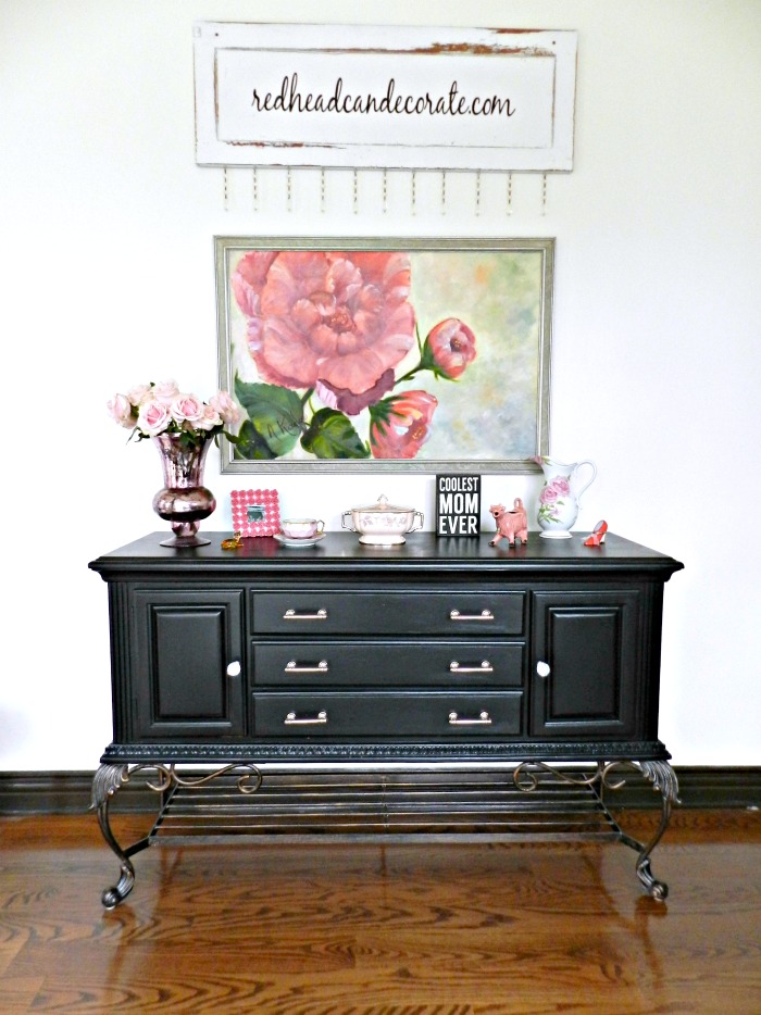 Check out this gorgeous black credenza makeover! When in doubt paint to black.