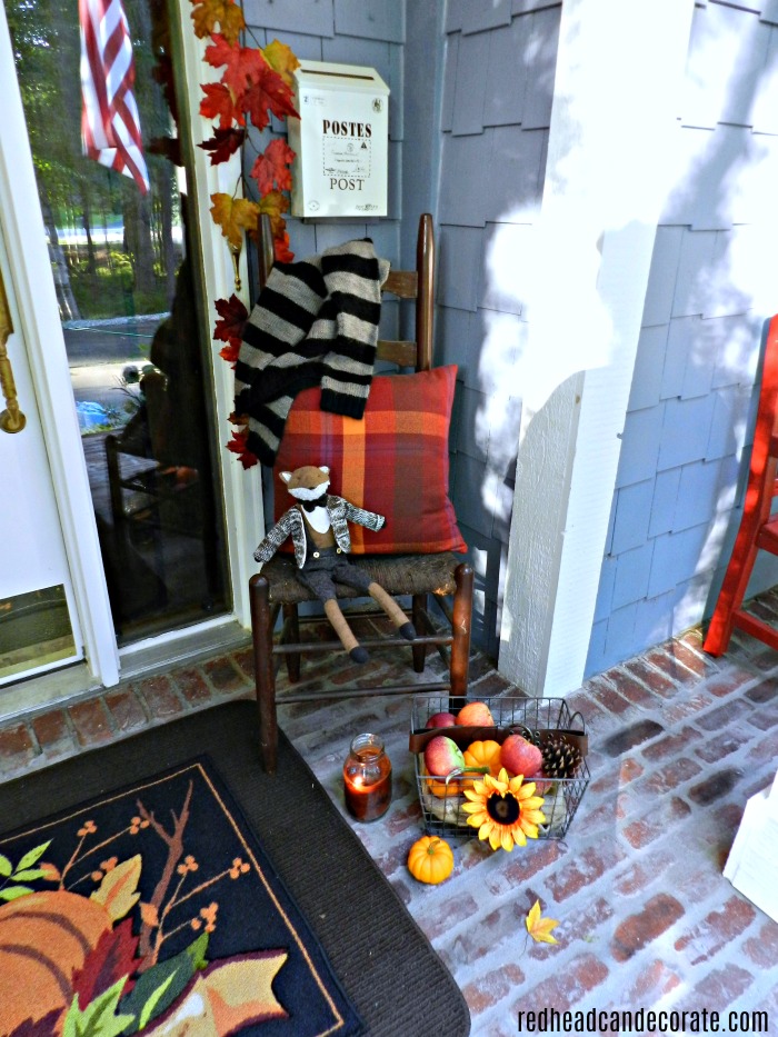Take the beautiful tour of this "Cozy Fall Porch" by redheadcandecorate.com. She uses warm rustic accents, but doesn't spend a fortune creating a Fall Porch everyone loves!