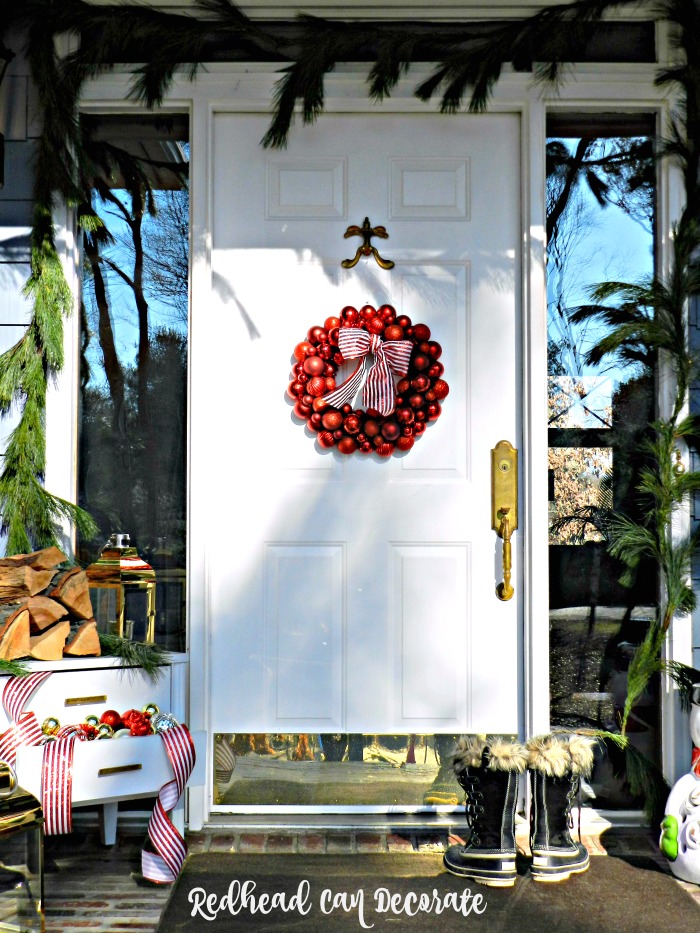 Michigan woman tries Fresh Pine Garland for the first time for her Christmas Porch. She explains how to hang it.