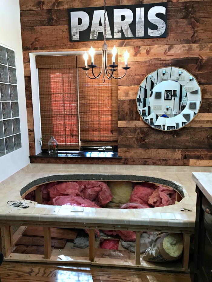 This Michigan Mom grew tired of the dated jacuzzi tub and plain ceramic tile. It was time for an update and a beautiful master bathroom makeover!