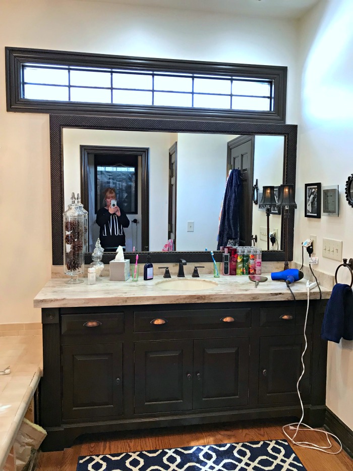  This Michigan Mom grew tired of the dated jacuzzi tub and plain ceramic tile. It was time for an update and a beautiful master bathroom makeover!