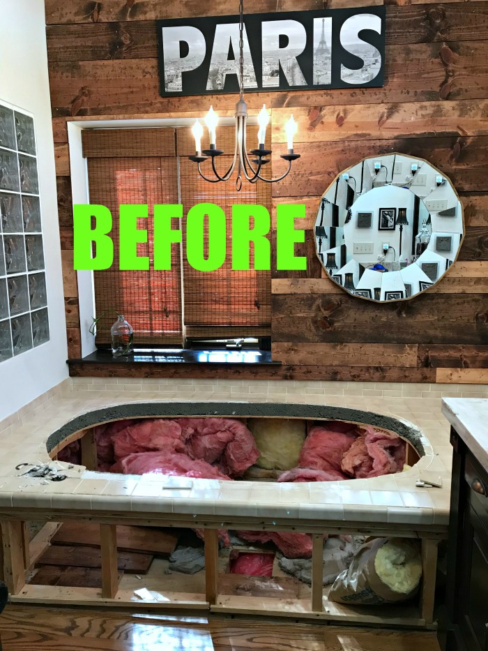 This Master Bathroom Renovation Tile Reveal is an amazing home improvement transformation. They saved the hardwood and the tile is stunning!