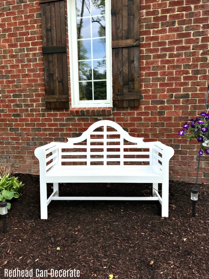 Check out this gorgeous white garden bench this blogger used to fill in a bare spot of her garden...