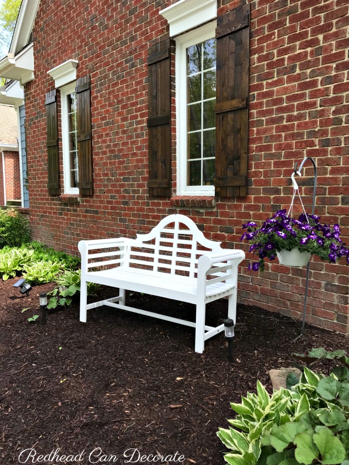 Check out this gorgeous white garden bench this blogger used to fill in a bare spot of her garden...