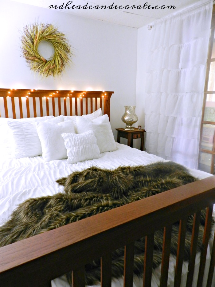 This beautiful basement guest room makeover transformation is so beautiful, and she did it on a tight budget!