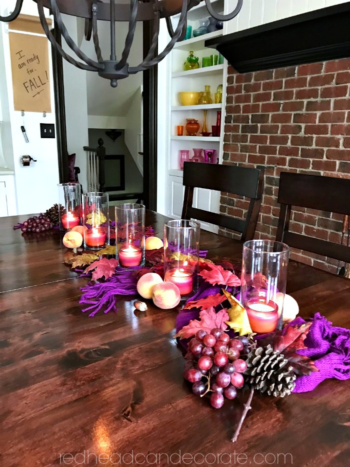 This Peach & Purple Fall Table is so gorgeous with all those colors! She used dollar store items and peaches, and even grapes!