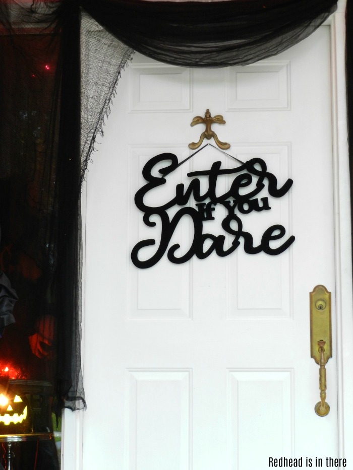 This DIY Spooky Witch Halloween Porch has just the right amount of spooky for all ages. 