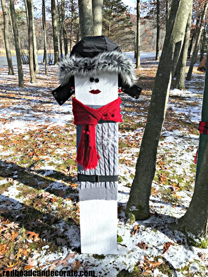What a cute idea to use an old shutter or scrap wood to make a wood snowman couple for your front yard--->Thrifty Style Snowman Lovers