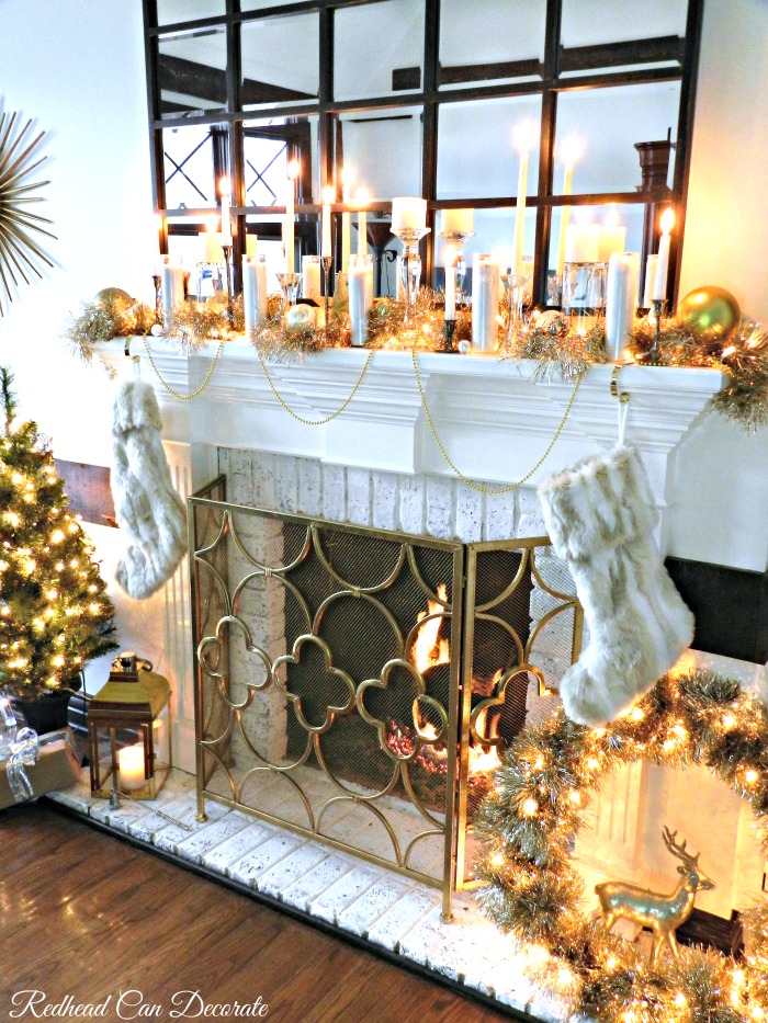 This mom blogger used dollar store candles for this Glamorous Christmas Mantel! She gives a full tutorial on how!