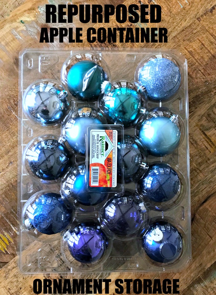 This Repurposed Costco Plastic Apple Container is a smart way to no only recycle, but to save your Christmas ornaments!