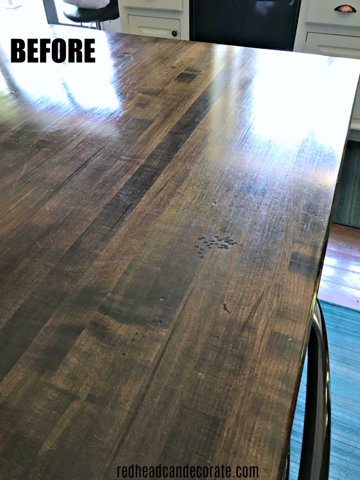 This DIY Refinished Butcher Block Kitchen Island is absolutely gorgeous, and she shares the products she used!