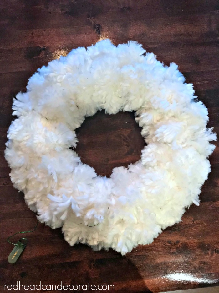 This DIY simple Snowy Fall Spiced Wreath captures both fall and winter in a beautiful wreath that can be made on a tight budget.