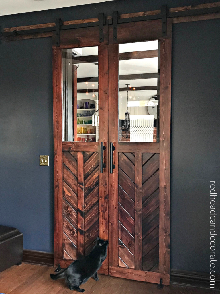 This gorgeous blue grey color looks amazing as a back drop in this beautiful family room (Zen Lounge Blue) a mom created during the pandemic to help her family relax.  The wood barn door is a must see!