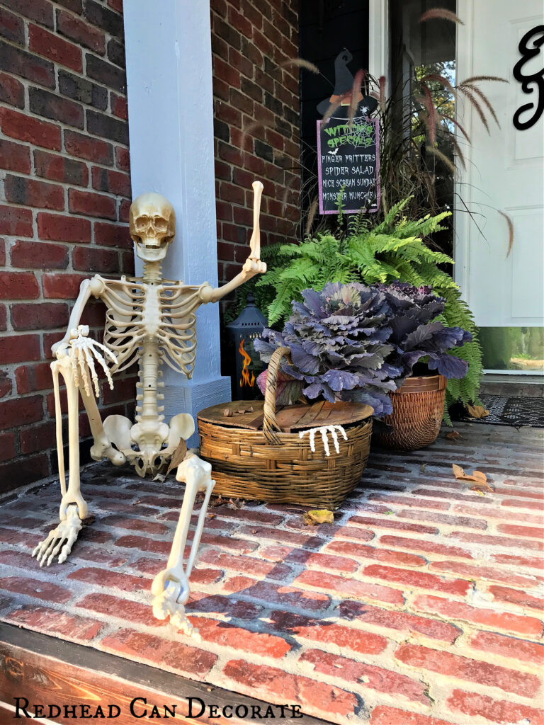 Add Big Skeletons to the Porch for a Fun Halloween Treat