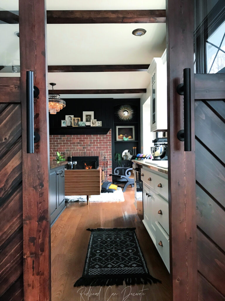 Transform your dated shelves with black paint.  Our "Black Paint Magic Makeover in the Kitchen" turned into quite the magical transformation!