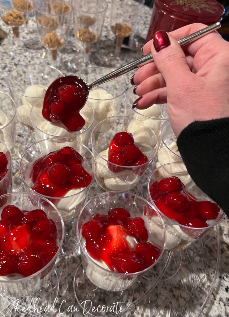 These easy no-bake individual serving Cherry Cheesecake Cocktails are a fun alternative to traditional style cheesecake.  Serve these gorgeous chilled cherry treats to your guests easily, and germ free with instant clean-up, too.