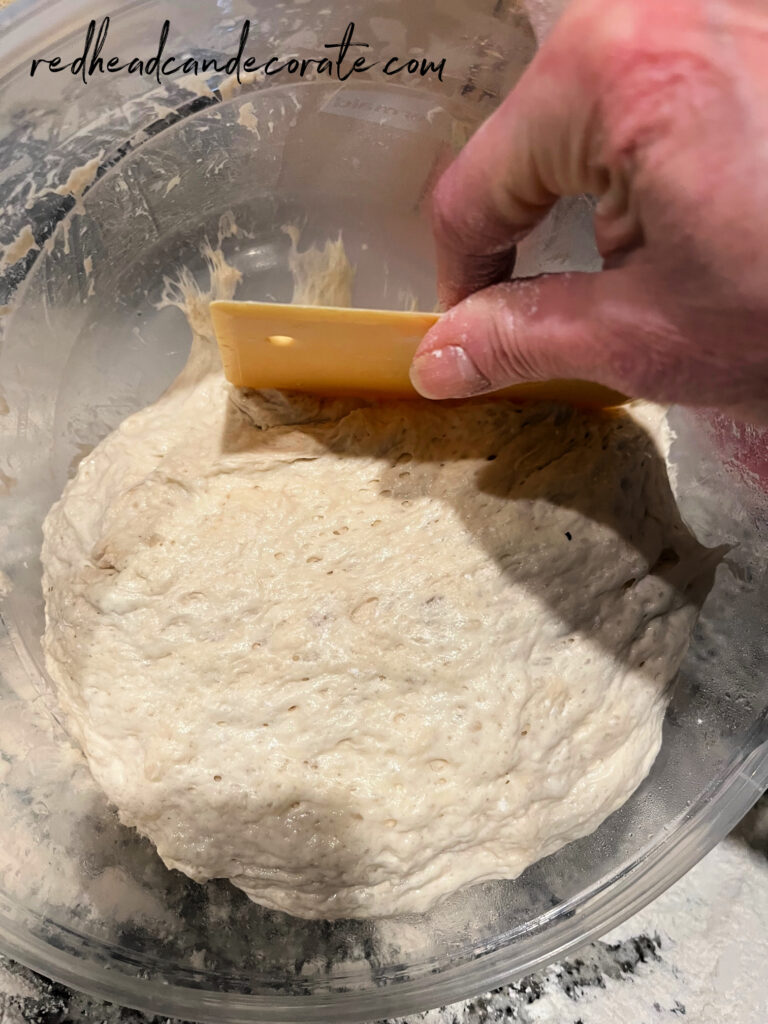 Easy overnight artisan bread recipe is so simple that non-cooks, or seasoned bakers should give this a try!  This bread is crispy on the outside, and soft and airy on the inside.  Perfect for soups, salads, sandwiches, or spaghetti and meatballs.  This homemade bread recipe is a must try.