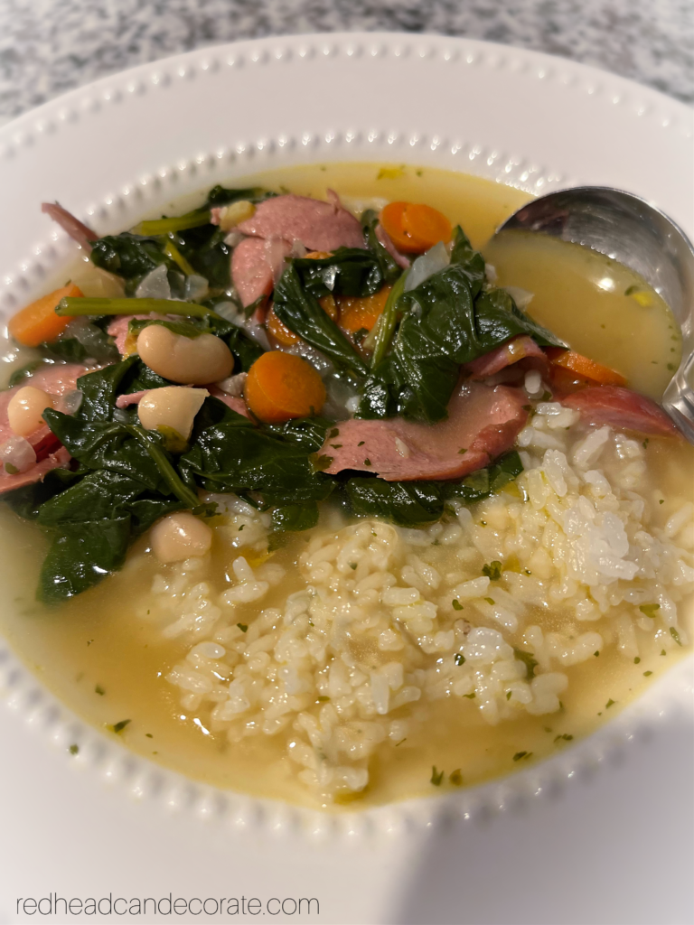 Redhead's Simple Sausage, Spinach & Bean Soup is packed with savory sausage, hearty veggies, and whips up in just a couple minutes.  Serve over rice, pasta, or even pierogi.